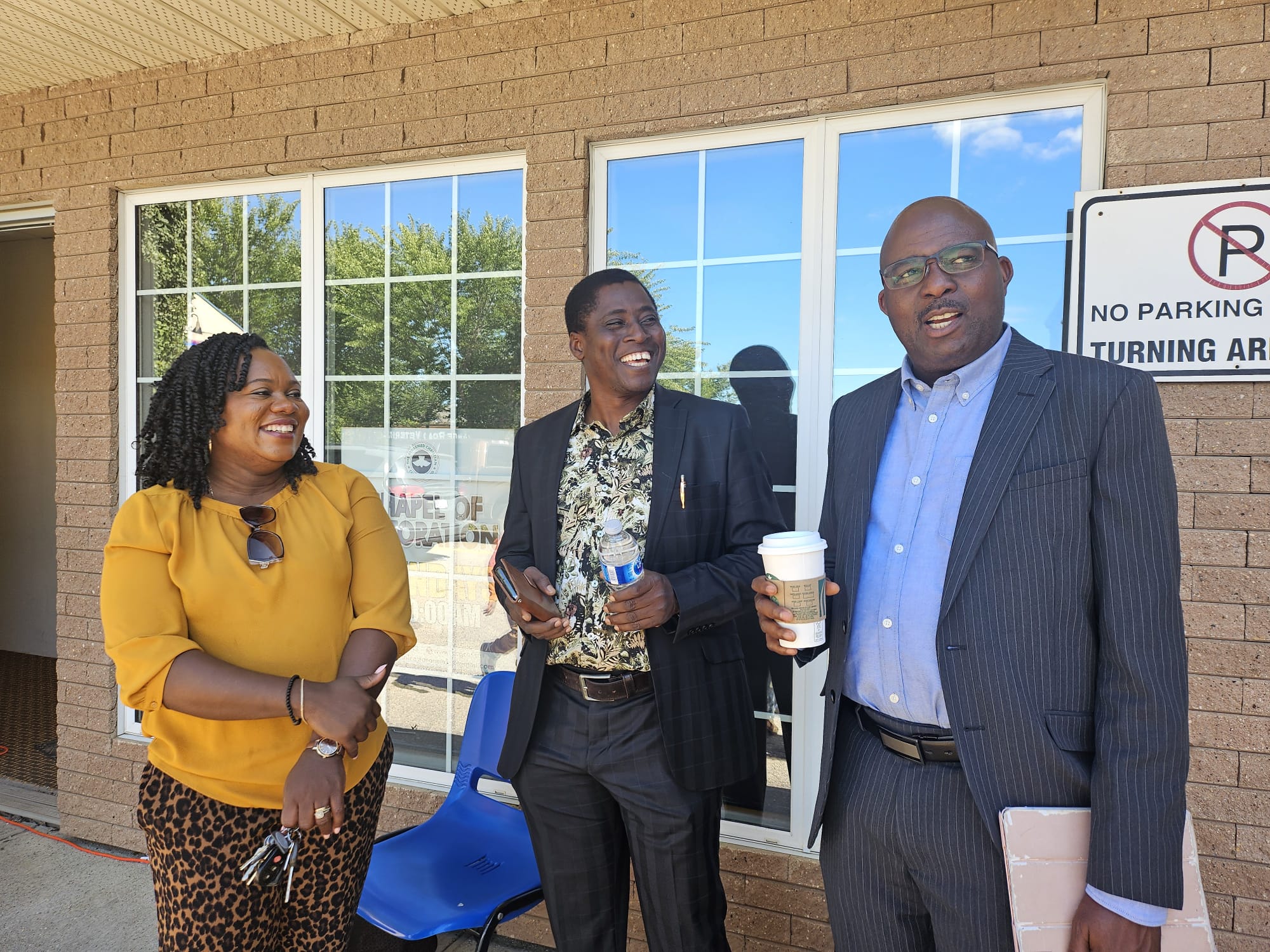 Church members outside the building